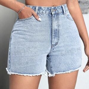 Light wash distressed blue denim shorts